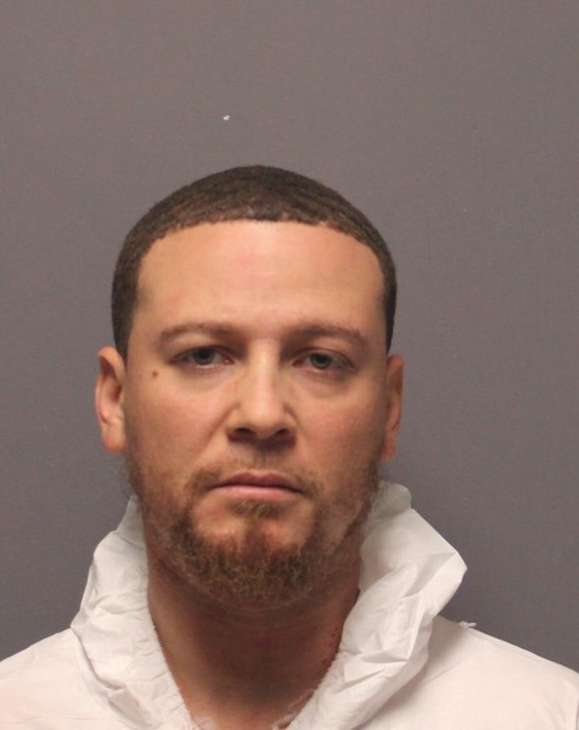 CHARGED: Michael A. Jones, 33, of 25 Queen St., Cranston, was arrested and charged following the “accidental” shooting of his four-year-old son on Halloween morning.
